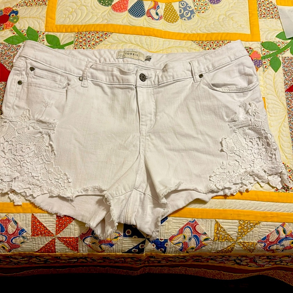 White embroidered cut off shorts